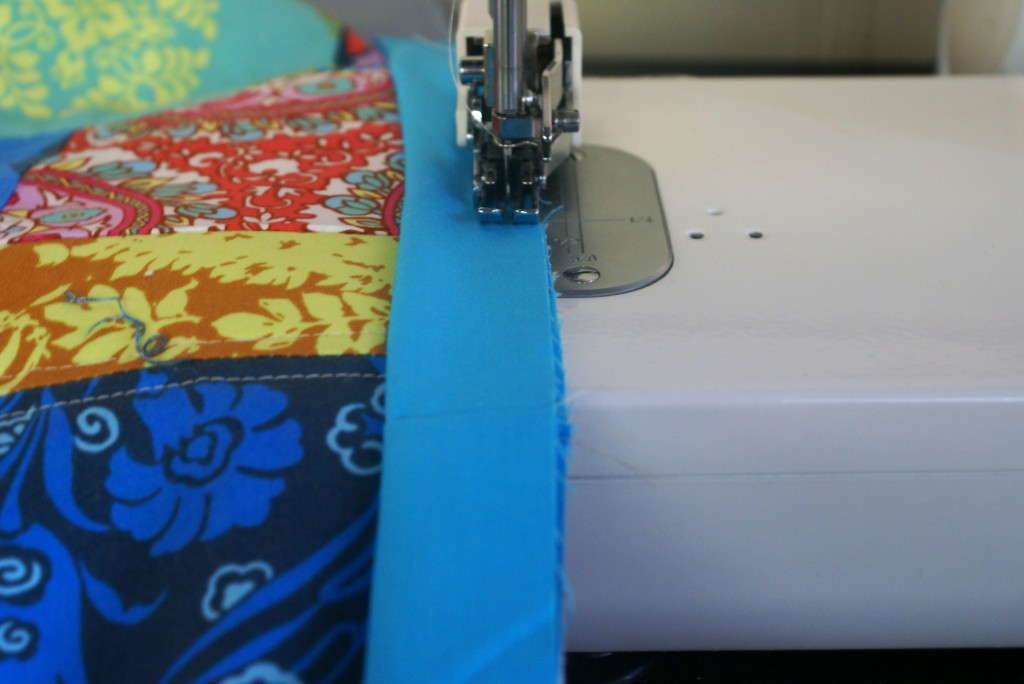 Use a 1/4 inch all along the front of the quilt.  