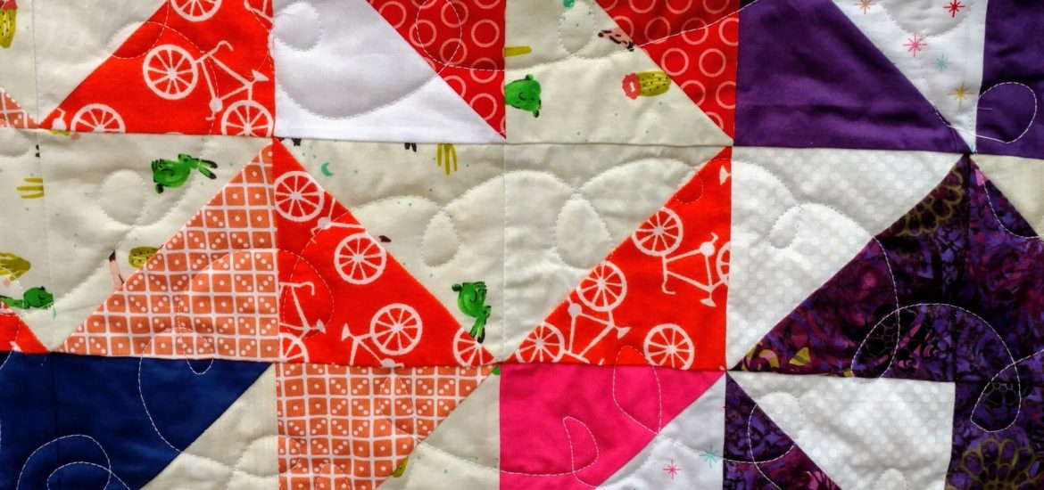 rainbow quilt, scrap quilt, scrappy quilt, half square triangle, HST quilt, baby quilt, sewing with kids